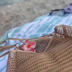 Summer large-capacity hollow mesh beach tote bag, lightweight and quick-drying polyester, versatile design with multiple interior and exterior pockets, perfect for family vacation, commute, and shopping.*brown