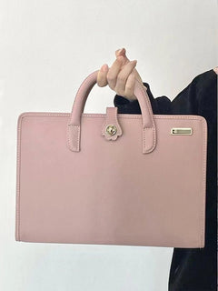 Stylish Leather Laptop Sleeve with Handle and Perforated Design - Soft Pink Color