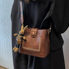Vintage Style PU Leather Bucket Bag with Wide Patterned Strap & Optional Bunny Charm(caramel)